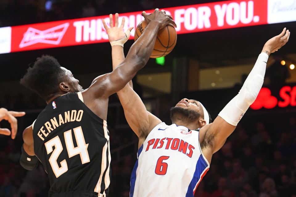 Detroit Pistons guard Bruce Brown (6) is fouled by Atlanta Hawks forward Bruno Fernando during the second half of an NBA basketball game Saturday, Jan. 18, 2020, in Atlanta. (AP Photo/John Amis)