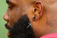 <p>This includes baseball caps, jewelry (like this cross earring on offensive tackle Morgan Moses), sunglasses, <a href="https://www.battleredblog.com/2016/9/15/12924794/the-nfl-s-ridiculous-uniform-policy-illustrated" rel="nofollow noopener" target="_blank" data-ylk="slk:and other accessories;elm:context_link;itc:0;sec:content-canvas" class="link ">and other accessories</a> that could be deemed unnecessary to the game. </p>