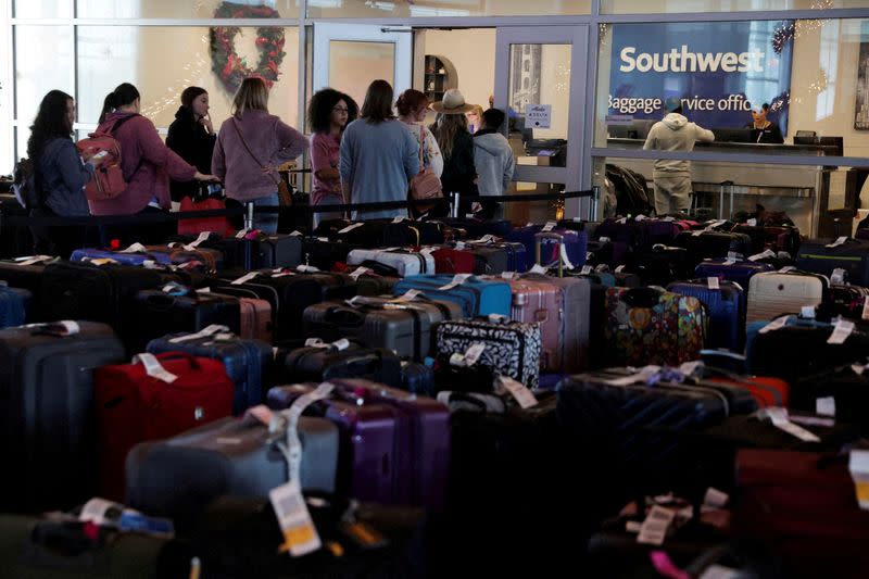 FILE PHOTO: Travelers deal with weather cancellations at Dallas Love Field Airport