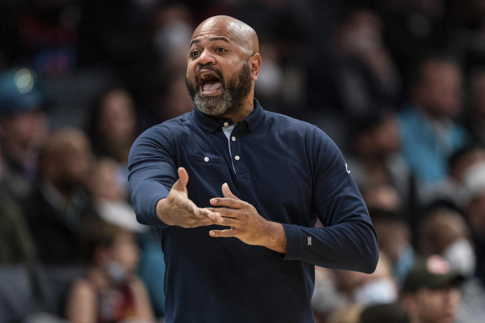 Cleveland Cavaliers head coach J. B. Bickerstaff reacts during the first half of an NBA basketball game against the Charlotte Hornets in Charlotte, N.C., Friday, Feb. 4, 2022. (AP Photo/Jacob Kupferman)