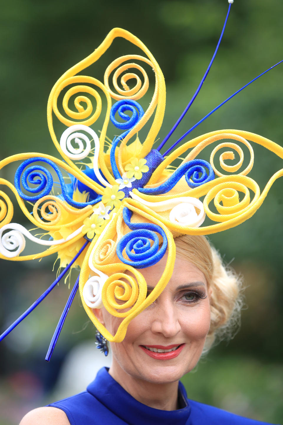 Racegoer Rachel Oates, from Hampshire, wearing a statement hat fashioned to resemble a butterfly. <em>[Photo: PA]</em>