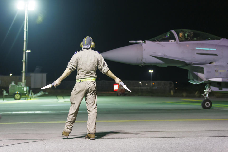 This photo issued by the Ministry of Defence (MOD) on Sunday. Feb. 4, 2024 shows a RAF Typhoon FGR4 aircraft returning to the base in Cyprus, following strikes against Houthi targets in Yemen. The U.S. and Britain struck 36 Houthi sites in Yemen in a second wave of assaults meant to further disable Iran-backed groups that have relentlessly attacked American and international interests in the wake of the Israel-Hamas war. In addition to the strikes on Saturday, U.S. Central Command says it conducted an additional “self-defense” strike on Sunday against a Houthi anti-ship cruise missile. (CAS1 Jake Green/RAF via AP)