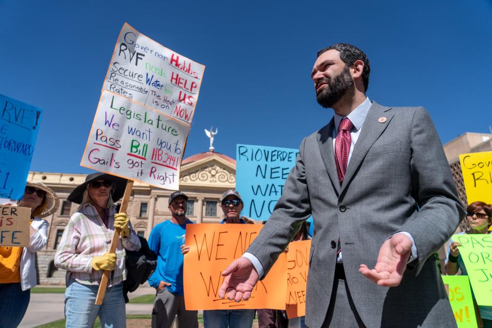 Arizona Rep. Alexander Kolodin (right) speaks with Rio Verde Foothills residents as they advocate for the passage of House Bills 2561 and 2441 at the Arizona state Capitol in Phoenix on April 26, 2023.