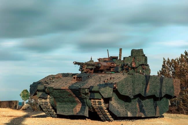 <p>Report says speed restrictions had been caused by excessive vibrations in the Ajax tanks and that crews were limited to 90 minutes inside them at a time</p> (Ministry of Defence)