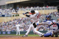 Minnesota Twins' Alex Kirilloff hits a solo home run against the Chicago Cubs during the first inning of a baseball game Saturday, May 13, 2023, in Minneapolis. (AP Photo/Abbie Parr)