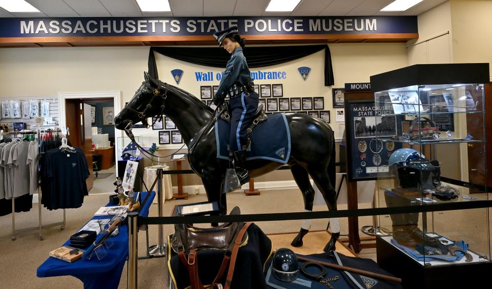 Massachusetts State Police Lt. Maureen Wesinger Lewis, who died in the line of duty June 18, 2018, and was a skilled equestrian, is depicted pn a horse at the Massachusetts State Police Museum and Learning Center.