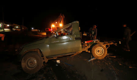 The wreckage of a police truck involved in an accident after a fireball from a tanker engulfed several vehicles and killed several people, is recovered near the Rift Valley town of Naivasha, west of Kenya's capital Nairobi, December 11, 2016. REUTERS/Thomas Mukoya