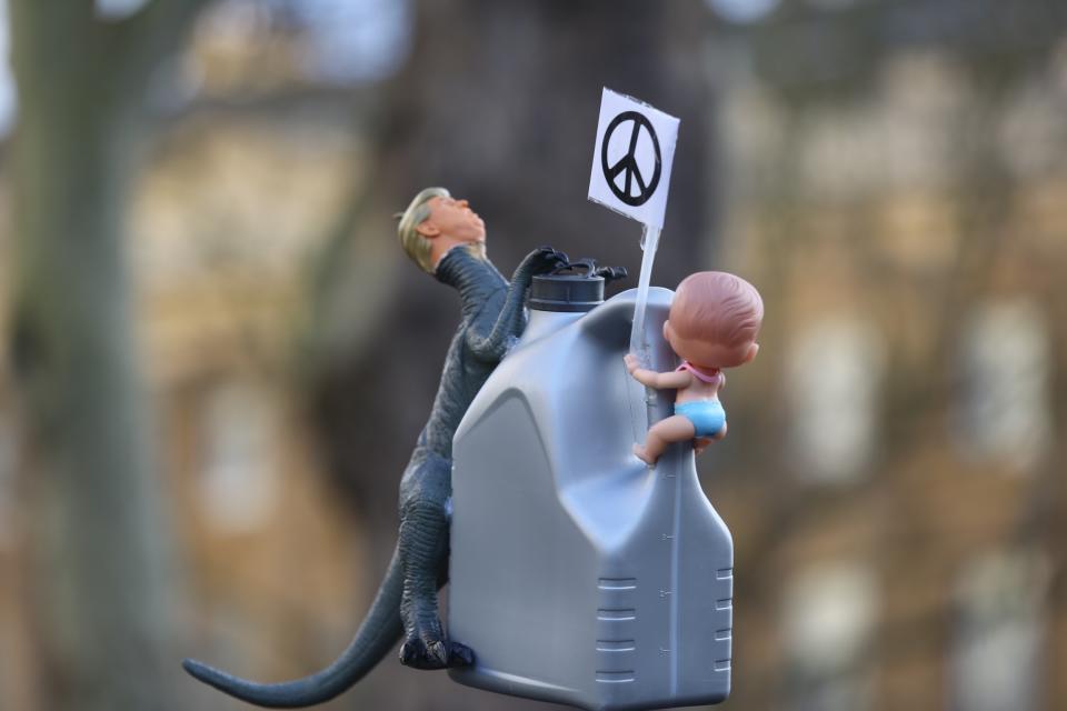 LONDON, UNITED KINGDOM - JANUARY 04 : A demonstrator holds an effigy during an anti-war rally following the killing of Iranian Revolutionary Guards' Quds Force commander Qasem Soleimani by a US airstrike in the Iraqi capital Baghdad, on January 04, 2020 at Downing Street in London, United Kingdom. (Photo by Ilyas Tayfun Salci/Anadolu Agency via Getty Images)