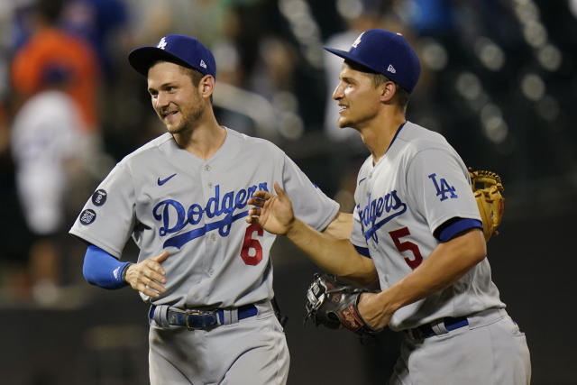 Los Angeles Dodgers' Corey Seager (5) scores a run against the New York  Mets on a double by Cody Bellinger during the 10th inning of a baseball  game Saturday, Aug. 14, 2021