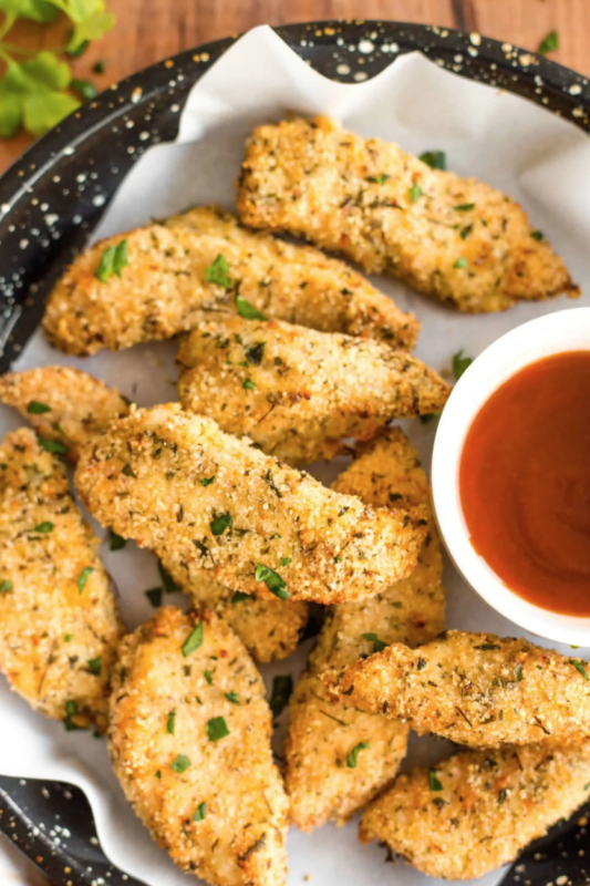 Dish by Dish<p>Impossibly crispy outside and amazingly juicy inside, these air fryer chicken tenders are finger-licking good. Gluten-free and dairy-free.</p><p><strong>Get the recipe: <a href="https://www.dishbydish.net/air-fryer-chicken-tenders/" rel="sponsored" target="_blank" data-ylk="slk:Crispy Air Fryer Chicken Tenders;elm:context_link;itc:0;sec:content-canvas" class="link "><em>Crispy Air Fryer Chicken Tenders</em></a></strong></p>
