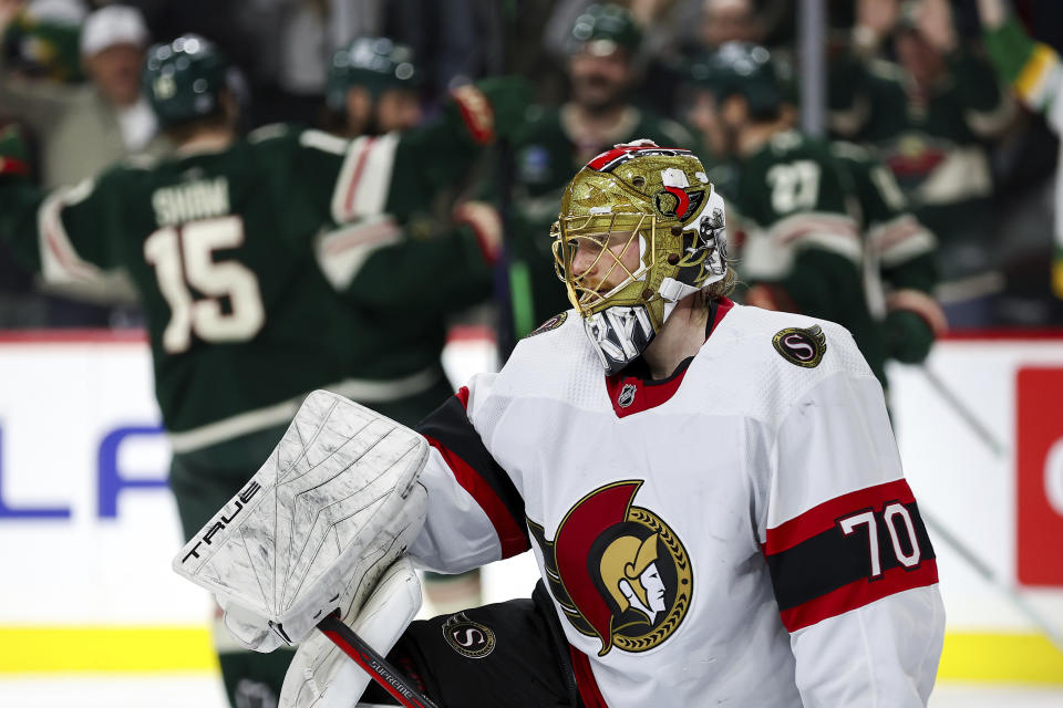 Ottawa Senators goaltender Joonas Korpisalo (70) reacts after giving up a goal to Minnesota Wild center Vinni Lettieri during the third period of an NHL hockey game Tuesday, April 2, 2024, in St. Paul, Minn. (AP Photo/Matt Krohn)