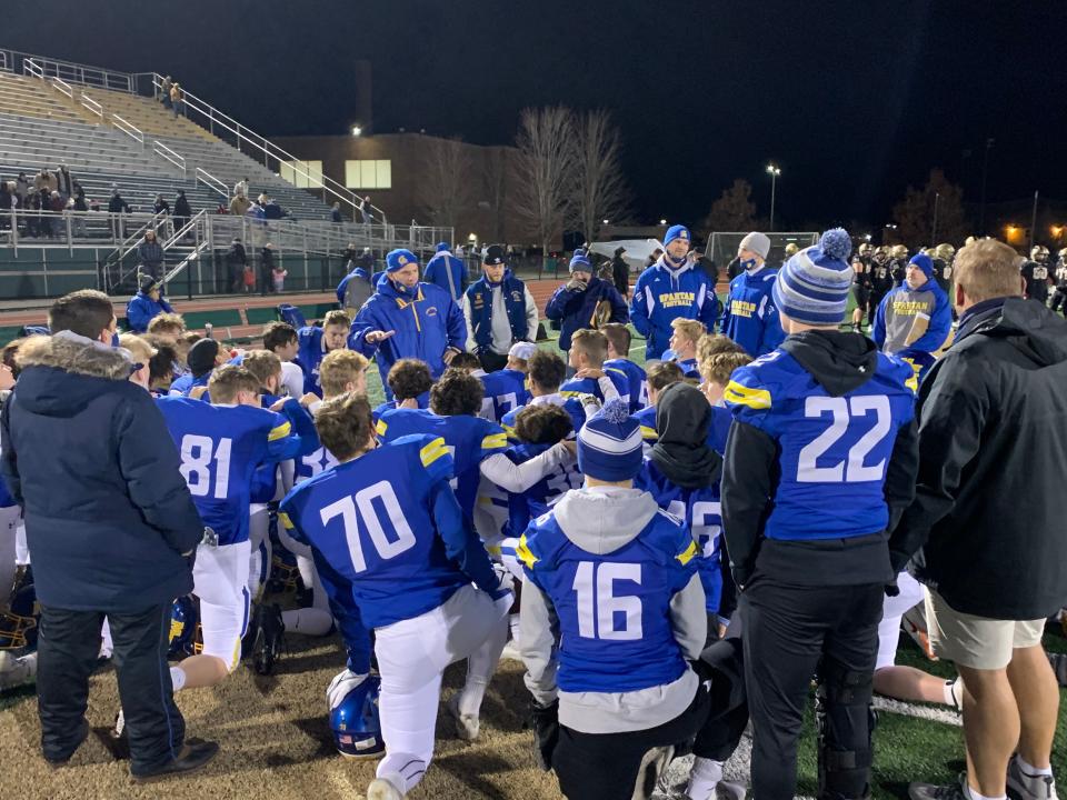 Maine-Endwell head coach Matt Gallagher speaks to his team after a 48-22 victory in the Section 4 class B quaterfinals Saturday.