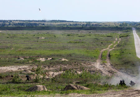 Ukrainian servicemen launch a missile during a test of the U.S. anti-tank missile systems at a shooting range in an unknown location, Ukraine May 22, 2018. Mikhail Palinchak/Ukrainian Presidential Press Service/Mikhail Palinchak/Handout via REUTERS