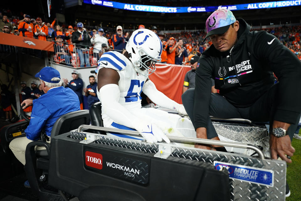 Indianapolis Colts defensive end Kwity Paye (51) is carted off the field after an injury against the Denver Broncos during the second half of an NFL football game, Thursday, Oct. 6, 2022, in Denver. (AP Photo/Jack Dempsey)