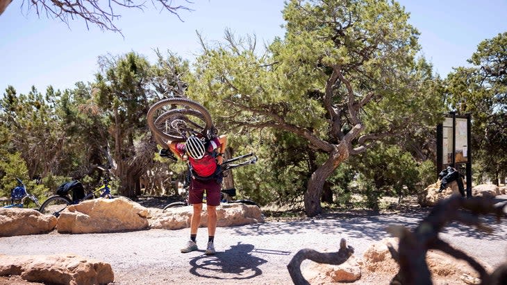 Lael Wilcox carrying bike