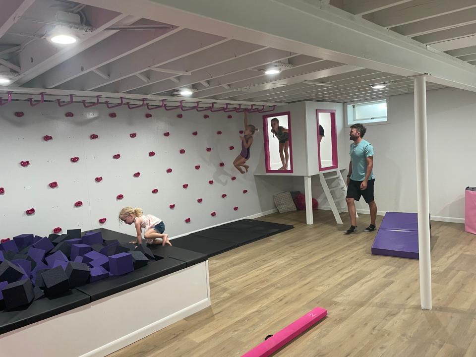 The Schirpke family enjoys their new home gymnastics gym.