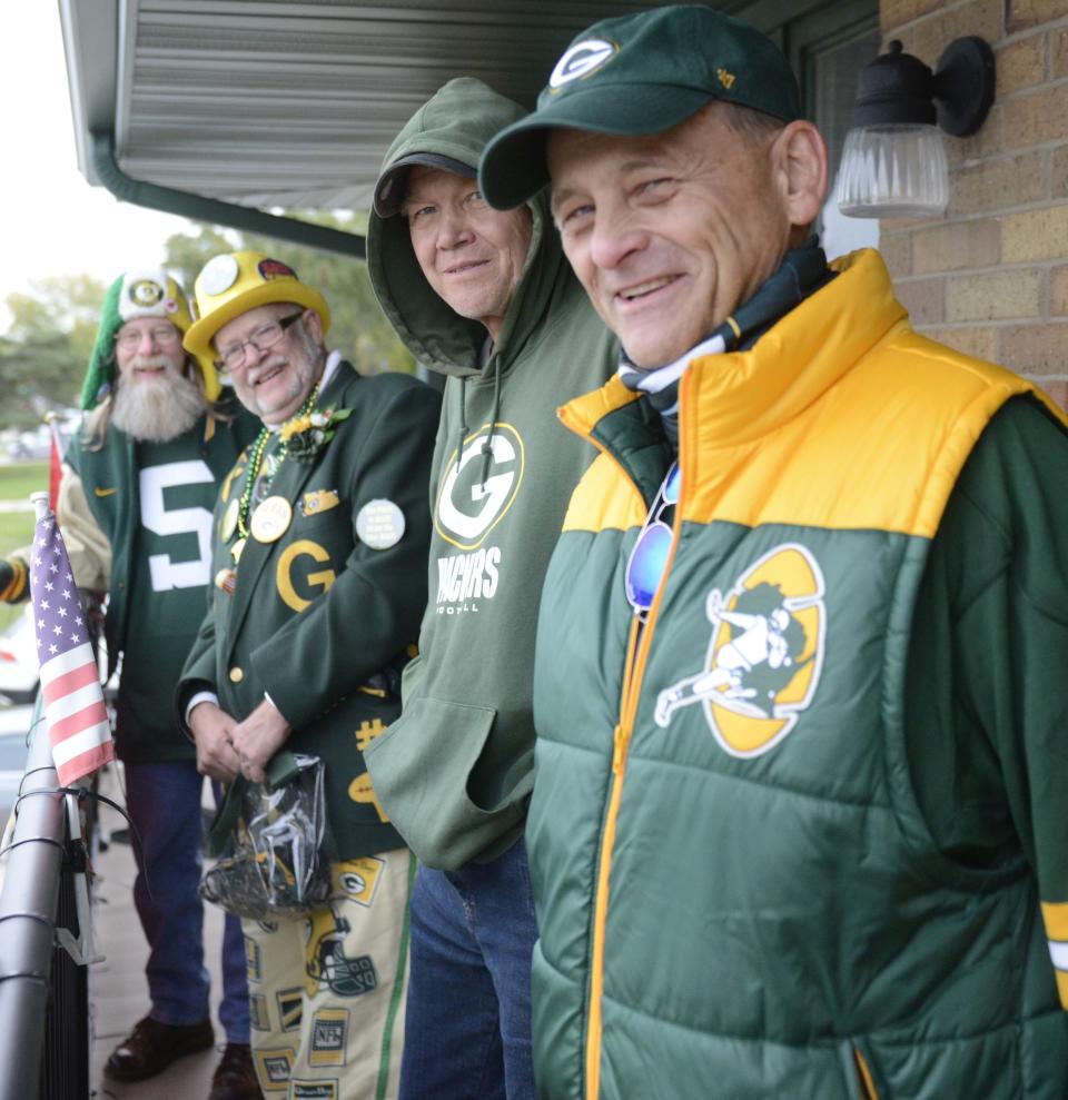 From left, Ned Larson of Rockford, Dan Loberger of Appleton, Dennis Brooks of Green Bay and Andy Larsen of Rockford after the Green Bay Packers-Washington Football Team game on Oct. 24, 2021, at Lambeau Field.