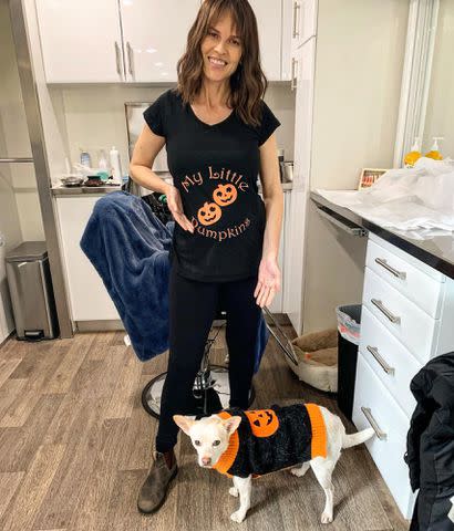 <p>Hilary Swank Instagram</p> Hilary Swank showing off her bump on Halloween in 2022.