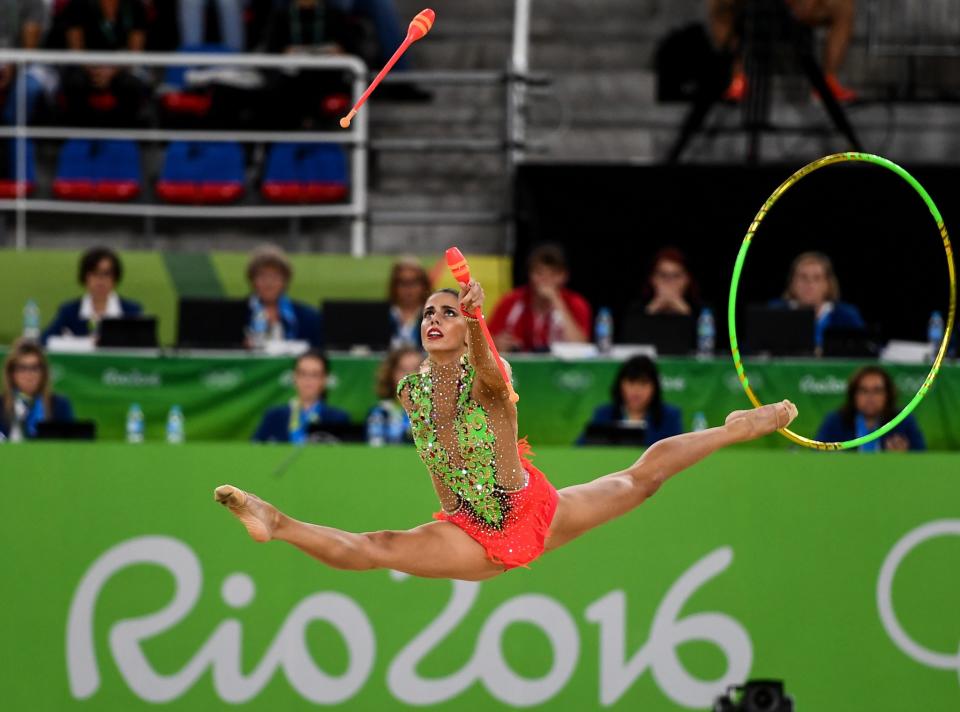 <p>The Spain team competing during the Rhythmic Gymnastics Group All-Around Final in the Rio Olympic Arena during the 2016 Rio Summer Olympic Games in Rio de Janeiro, Brazil. (Getty) </p>