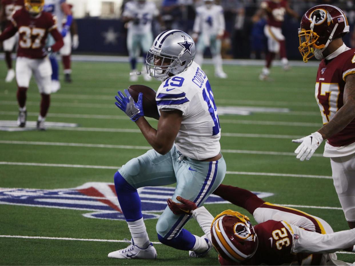 Dallas Cowboys and top receiver Amari Cooper agreed on a $100 million, five-year contract: AP