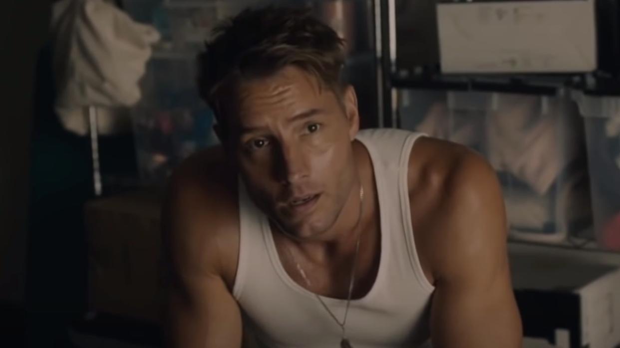  Justin Hartley as Kevin on This is Us sitting and kneeling on his knees. 