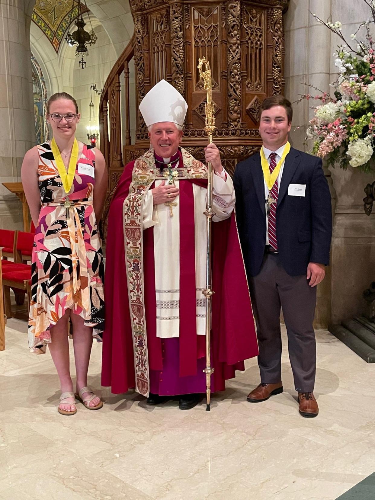 St. Joseph Central Catholic awarded the Bishop's Cross award to Madeline Michael and John Connell.