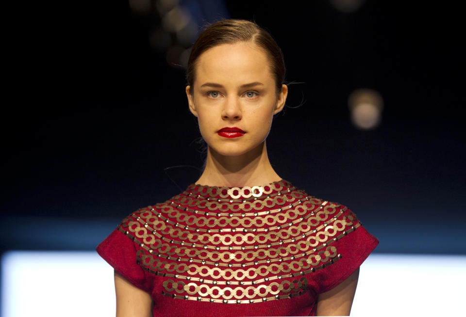 A model wears a creation by Peru's Sitka Semsch during the third edition of Lima Fashion Week in Lima, Peru, Monday, April 8, 2013. (AP Photo/Martin Mejia)