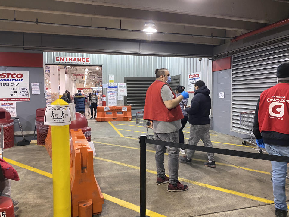 Long line of shoppers waiting to get into Costco Store, Social Distancing, Queens Center Mall. (Photo by: Lindsey Nicholson/Education Images/Universal Images Group via Getty Images)