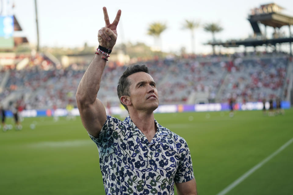 Wrexham co-owner Rob McElhenney gestures before a club friendly soccer match against Manchester United, Tuesday, July 25, 2023, in San Diego. (AP Photo/Gregory Bull)