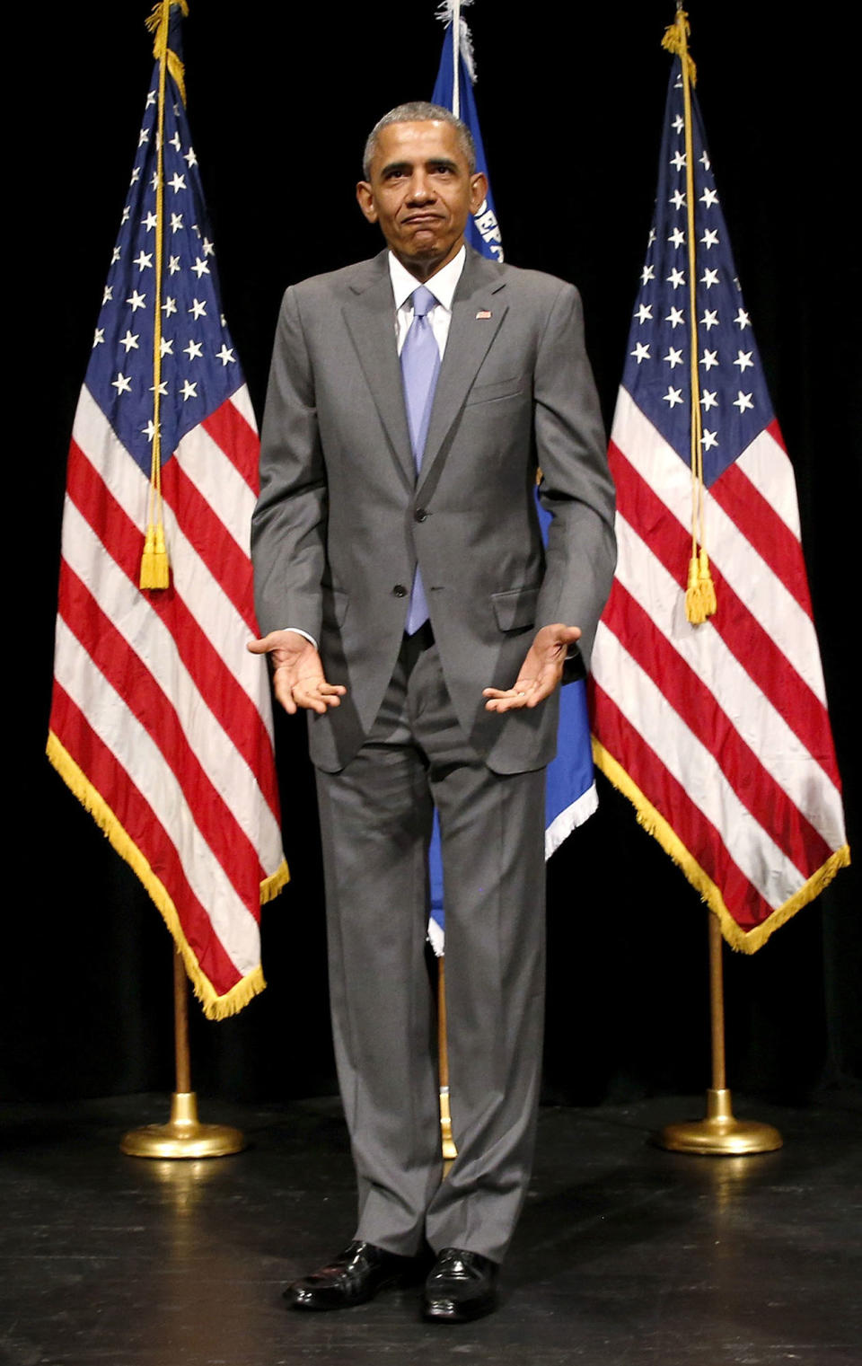 <p>President Barack Obama reacts as he is told where to stand during the investiture ceremony for Attorney General Loretta Lynch (unseen) at the Warner Theater in Washington June 17, 2015. (Jonathan Ernst/Reuters) </p>