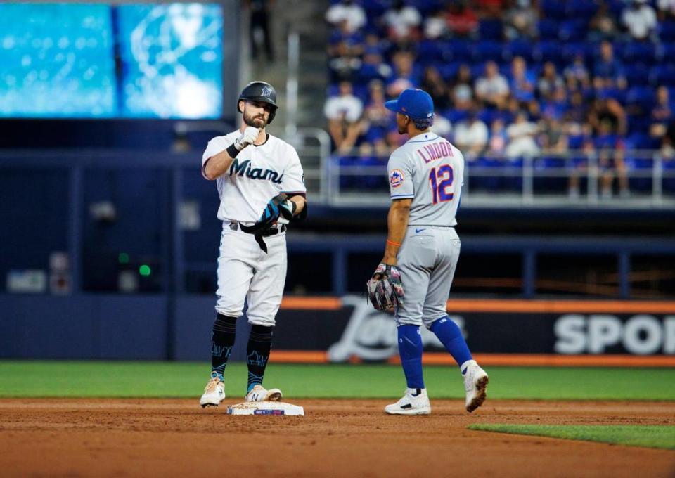 Miami Marlins left fielder Jon Berti (5) reacts after hitting a double during the first inning of a baseball game against the New York Mets at LoanDepot Park on Sunday, June 26, 2022 in Miami, Florida.