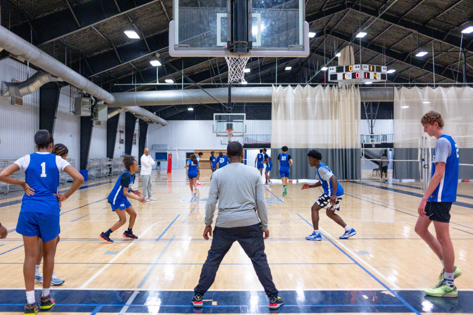 Coach Carlos Adamson runs drills during a Grind Prep basketball practice at the Oklahoma Athletic Center in Oklahoma City, on Monday, April 1, 2024.