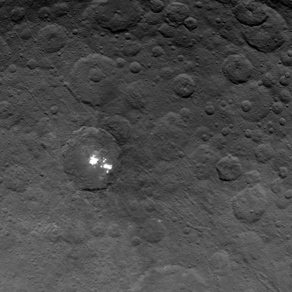 NASA's Dawn spacecraft obtained this image of the brightest spots on dwarf planet Ceres on June 6, 2015, from an altitude of 2,700 miles (4,400 kilometers). Image released June 10, 2015.