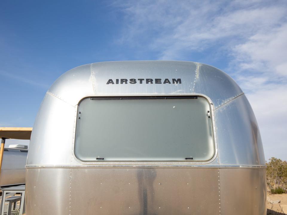 A close up of the rear of an Airstream trailer.