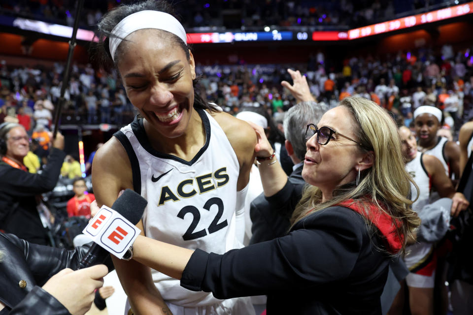 UNCASVILLE, CONNECTICUT - SEPTEMBER 18: A'ja Wilson #22 of the Las Vegas Aces celebrates with head coach Becky Hammon after defeating the Connecticut Sun 78-71 in game four to win the 2022 WNBA Finals at Mohegan Sun Arena on September 18, 2022 in Uncasville, Connecticut. NOTE TO USER: User expressly acknowledges and agrees that, by downloading and or using this photograph, User is consenting to the terms and conditions of the Getty Images License Agreement.  (Photo by Maddie Meyer/Getty Images)