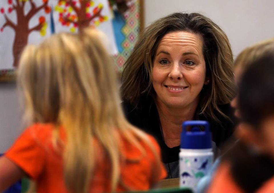 Leslie Hieb, owner of Level Up Learning preschool in Kennewick, smiles while talking with students enrolled in the facility’s full-time program. Bob Brawdy/bbrawdy@tricityherald.com