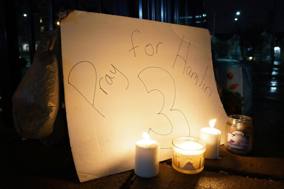 A vigil is displayed at the University of Cincinnati Medical Center for football player Damar Hamlin of the Buffalo Bills.<span class="copyright">Dylan Buell—Getty Images</span>