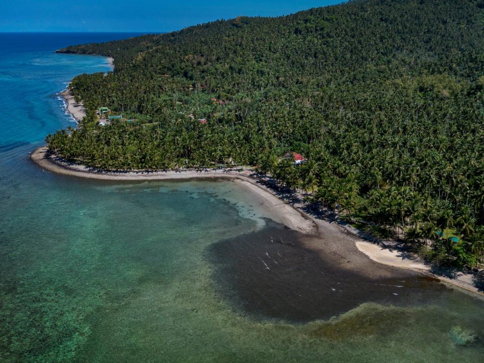 An aerial shot of the oil slick and Pola, Oriental Mindoro on March 8.