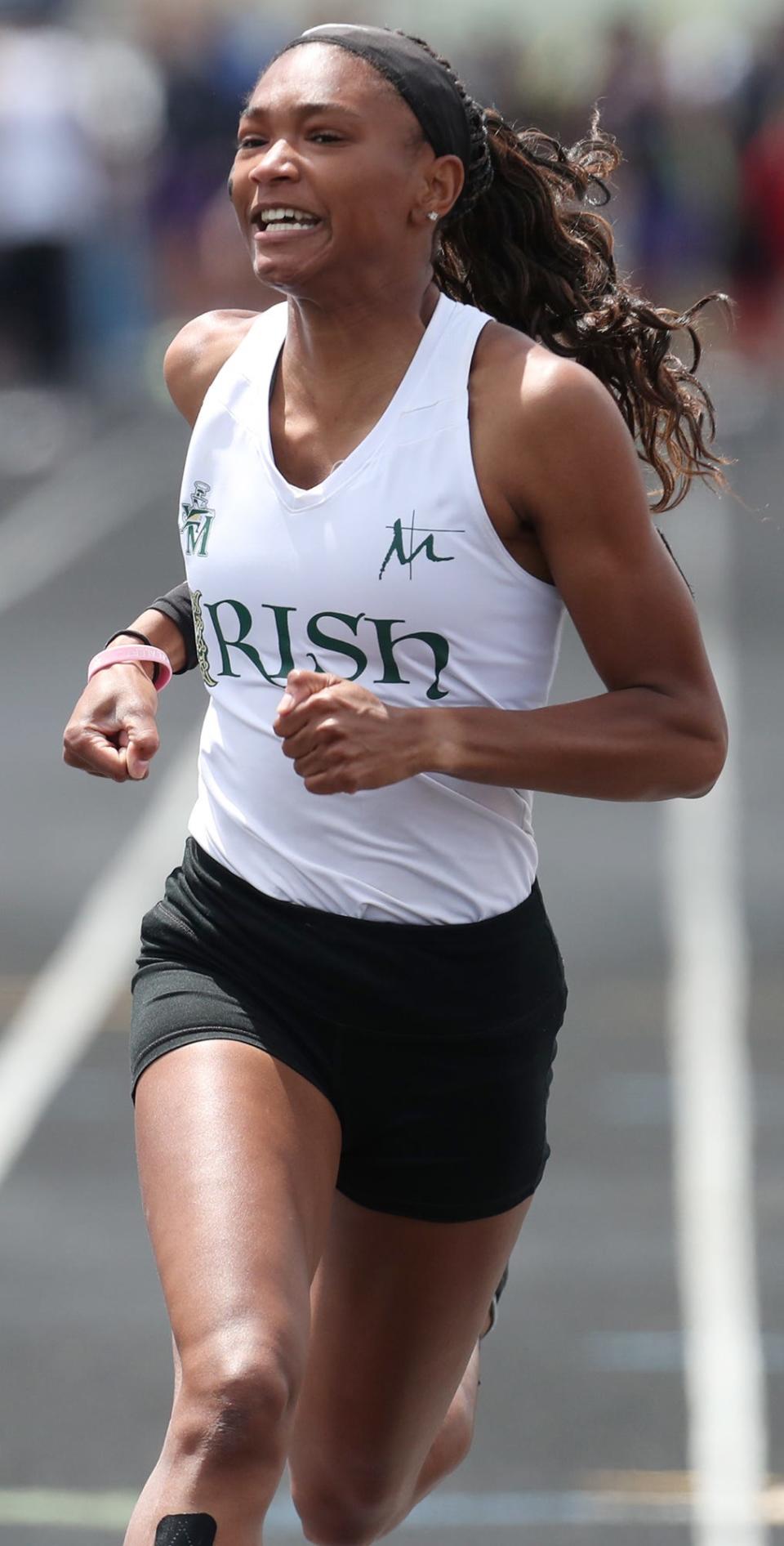 St. Vincent-St. Mary's Kya Epps takes first place in the girls 100 meter dash at the Div. II regional track and field tournament at Austintown Fitch High School on Saturday.