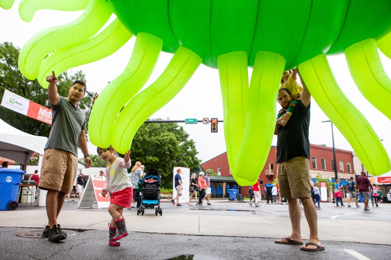 Despite the rainy weather people came to enjoy the art, crafts, shows and more at Artisphere in Greenville on Saturday, May 11, 2019.
(Credit: JON STEGENGA/GREENVILLE NEWS FILE)