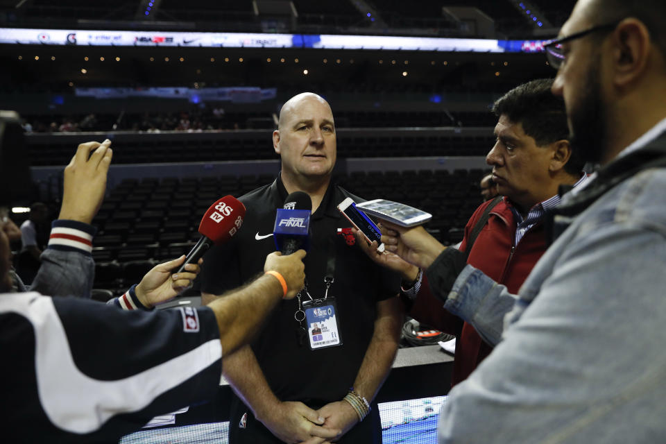 Chicago Bulls coach Jim Boylen talks to journalists before a basketball practice at Mexico City Arena in Mexico City, Wednesday, Dec. 12, 2018. The Bulls will face Orlando Magic Thursday in the first of two 2018 regular-season NBA games to be played in the high-altitude Mexican capital. (AP Photo/Rebecca Blackwell)