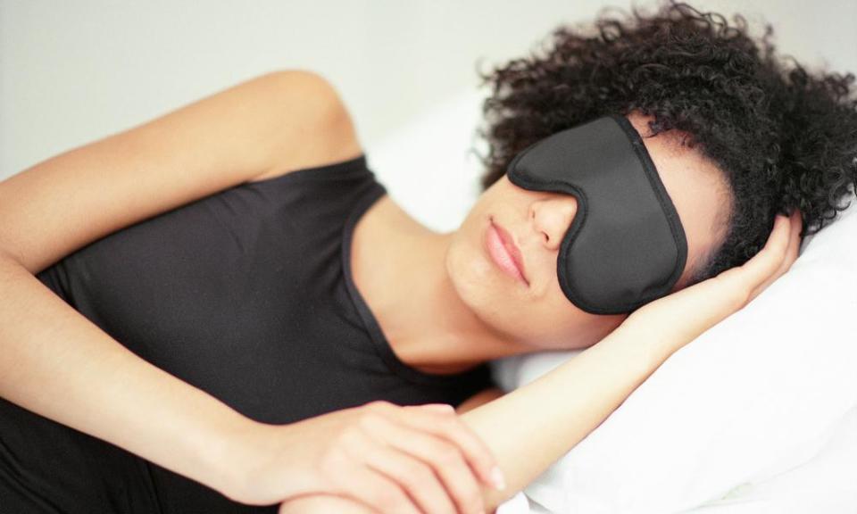 Woman sleeping with eye mask