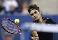 Roger Federer of Switzerland comes to the net during his men's singles match against Marinko Matosevic of Australia at the U.S. Open tennis tournament in New York August 26, 2014. REUTERS/Shannon Stapleton