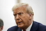 Former President Donald Trump sits in the courtroom with his legal team before the continuation of his civil business fraud trial at New York Supreme Court, Tuesday, Oct. 17, 2023, in New York. (AP Photo/Seth Wenig, Pool)