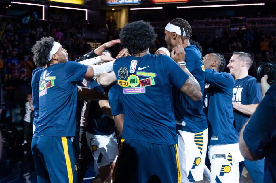 Feb 5, 2023; Indianapolis, Indiana, USA; Indiana Pacers team do a pregame scramble after lineups are announced before the game against the Cleveland Cavaliers at Gainbridge Fieldhouse. Mandatory Credit: Trevor Ruszkowski-USA TODAY Sports