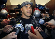 New England Patriots linebacker Junior Seau speaks to reporters at his locker after NFL football practice in Foxborough, Mass., Thursday, Jan. 7, 2010. The Patriots are preparing for Sunday's playoff game against the Baltimore Ravens. (AP Photo/Elise Amendola)