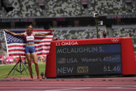 Gold medalist Sydney McLaughlin, of the United States, celebrates after winning the women's 400-meter hurdles at the 2020 Summer Olympics, Wednesday, Aug. 4, 2021, in Tokyo, Japan. (AP Photo/Petr David Josek)