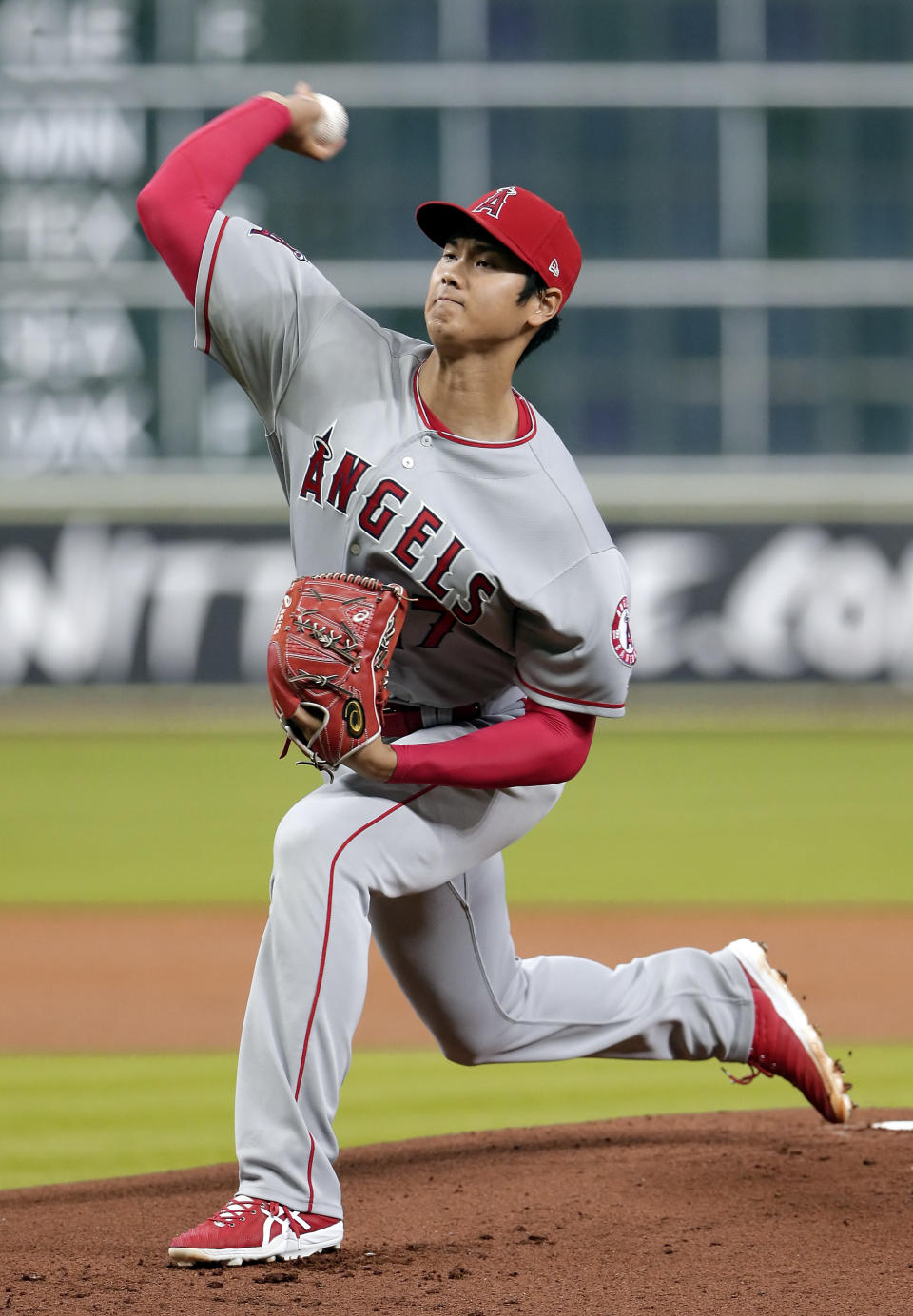 Los Angeles Angels starting pitcher Shohei Ohtani (17) throws against the Houston Astros during the first inning of a baseball game Sunday, Sep. 2, 2018, in Houston. (AP Photo/Michael Wyke)