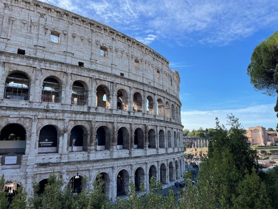 exterior shot of a side of the colosseum in rome, italy