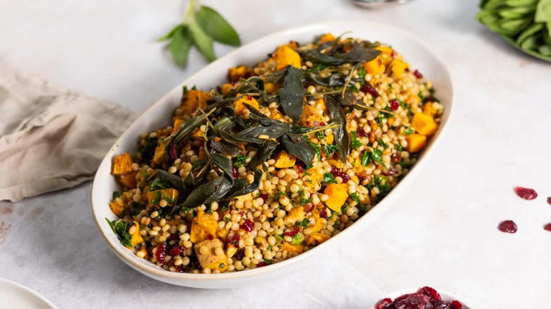 Couscous salad in white bowl